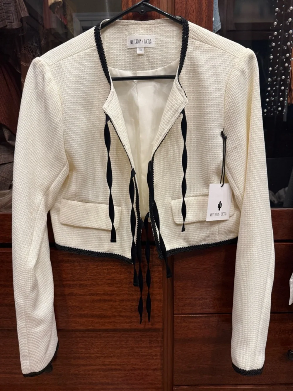 Ivory Cropped Bouclé Top with Black Trim and Bows - Picture 5 of 6